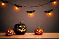 Three pumpkins on a table for Halloween