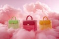 Three purses are shown in a pink cloud Royalty Free Stock Photo