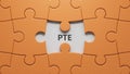 Three puzzle pieces with missing pieces with the letters PTE. Royalty Free Stock Photo