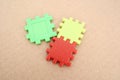 Three puzzle pieces in red, yellow, and green Royalty Free Stock Photo