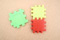 Three puzzle pieces in red, yellow, and green Royalty Free Stock Photo