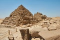 Pyramids of Queens near the Pyramid of Menkaure in Giza Royalty Free Stock Photo