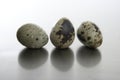 Three quail eggs