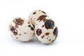 Three quail eggs over white background Royalty Free Stock Photo