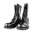 three quarter front view on pair of black leather 10-inch new black military combat boots, isolated on white background Royalty Free Stock Photo