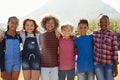 Three quarter length portrait of pre-teen friends in a park