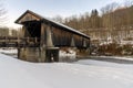 A three-quarter view of the snow covered Livingston Manor Covered Bridge
