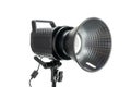 Three-quarter view of a studio light with deep reflector, isolated on white. Royalty Free Stock Photo