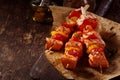 Three Raw Fish Kebabs on Table with Oil