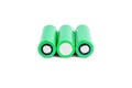 Three rechargeable batteries on a white background isolated. 18650 green batteries Royalty Free Stock Photo