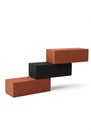 Three rectangular bricks are balanced in a step-like formation Royalty Free Stock Photo