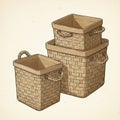 Three rectangular, woven baskets with sturdy rope handles are stacked in a nested Royalty Free Stock Photo