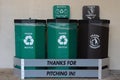 Two green and one black recycling bin outdoors Royalty Free Stock Photo