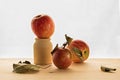 Red apple on wooden table on the white background Royalty Free Stock Photo