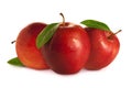 Three red apples with leaves