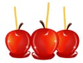 Three red candied apples