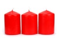 Three red candle wax on a white background Royalty Free Stock Photo