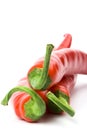 Three red chilly peppers Royalty Free Stock Photo