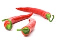 Three red chilly peppers Royalty Free Stock Photo