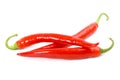 Three red chilly peppers Royalty Free Stock Photo