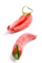 Three red chilly peppers Royalty Free Stock Photo