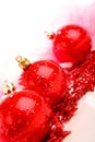 Three red christmas balls on stars isolated Royalty Free Stock Photo