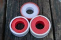 three red coils of fum tape Royalty Free Stock Photo