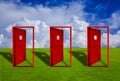 Three Red door placed on an outdoor lawn with blue sky floor