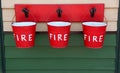 Three Red Fire Buckets Royalty Free Stock Photo