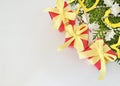 Three red gift boxes with yellow ribbons bow on white background. Royalty Free Stock Photo