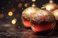 three red and gold christmas ornaments on a black background Royalty Free Stock Photo