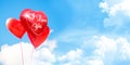 Three red heart shape balloons flying in the sky Royalty Free Stock Photo