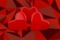 Three red hearts on a low poly red background