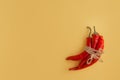 Three red hot chili peppers combined together Royalty Free Stock Photo