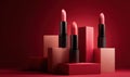 Three red lipstick tubes are displayed on a red background Royalty Free Stock Photo