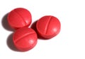 Three red medicine pills Royalty Free Stock Photo