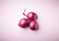 Three red onions Royalty Free Stock Photo