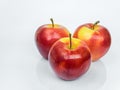 Three red ripe Gala apples isolated on a white background Royalty Free Stock Photo