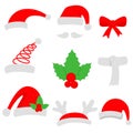 Three red santa hats and christmas stocking.