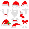 Three red santa hats, horns, mustache, beard and christmas stocking. Royalty Free Stock Photo