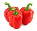 Three red sweet bell peppers with drops isolated on white background. clipping path Royalty Free Stock Photo