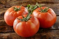 Three red tomatoes are on top of each other, high quality, high resolution Royalty Free Stock Photo