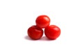 three red tomatoes on the white background Royalty Free Stock Photo