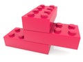 Three red toy bricks stacked on top of each other in different order