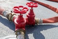 Three red water valves Royalty Free Stock Photo