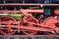 Red wheels of an old steam locomotive Royalty Free Stock Photo