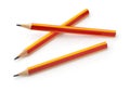 Three red and yellow graphite pencils Royalty Free Stock Photo