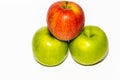 Three red, yellow and green apples isolated on a white background Royalty Free Stock Photo