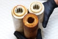 Three replaceable used water filters. Replaceable dirty filters for filtration of reverse osmosis water.