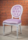 Three retro chair against a white wall Royalty Free Stock Photo